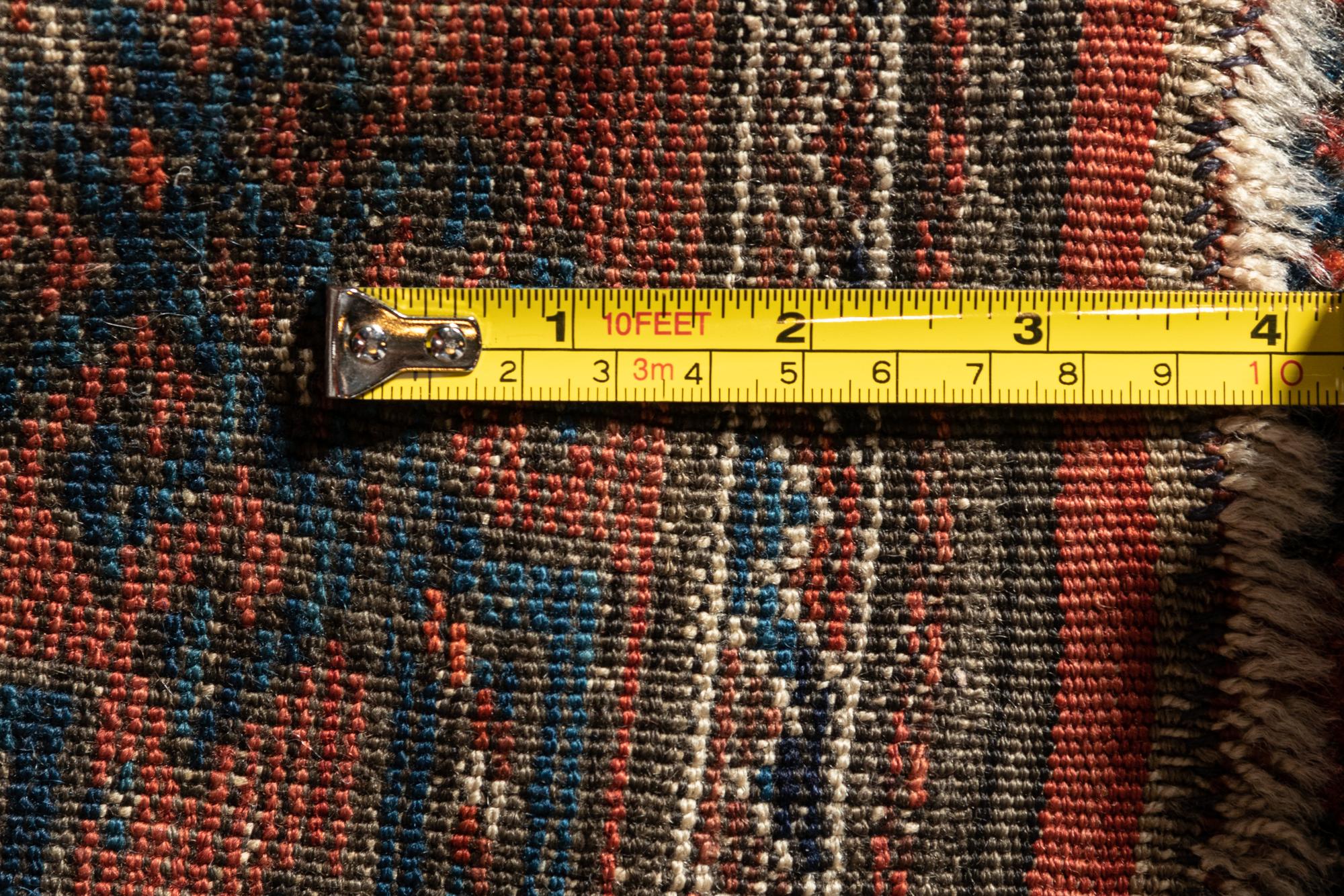 A Baluchi Wool Rug