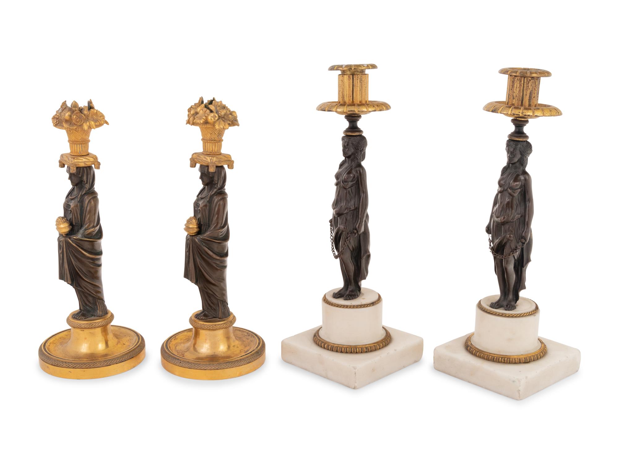 Two Pairs of French Gilt and Patinated Bronze Figural Candlesticks