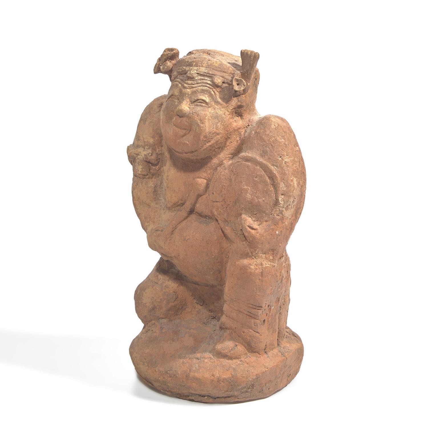 A Chinese Red Pottery Figure of a Story Teller, Eastern Han Dynasty 東漢 擊鼓説唱俑