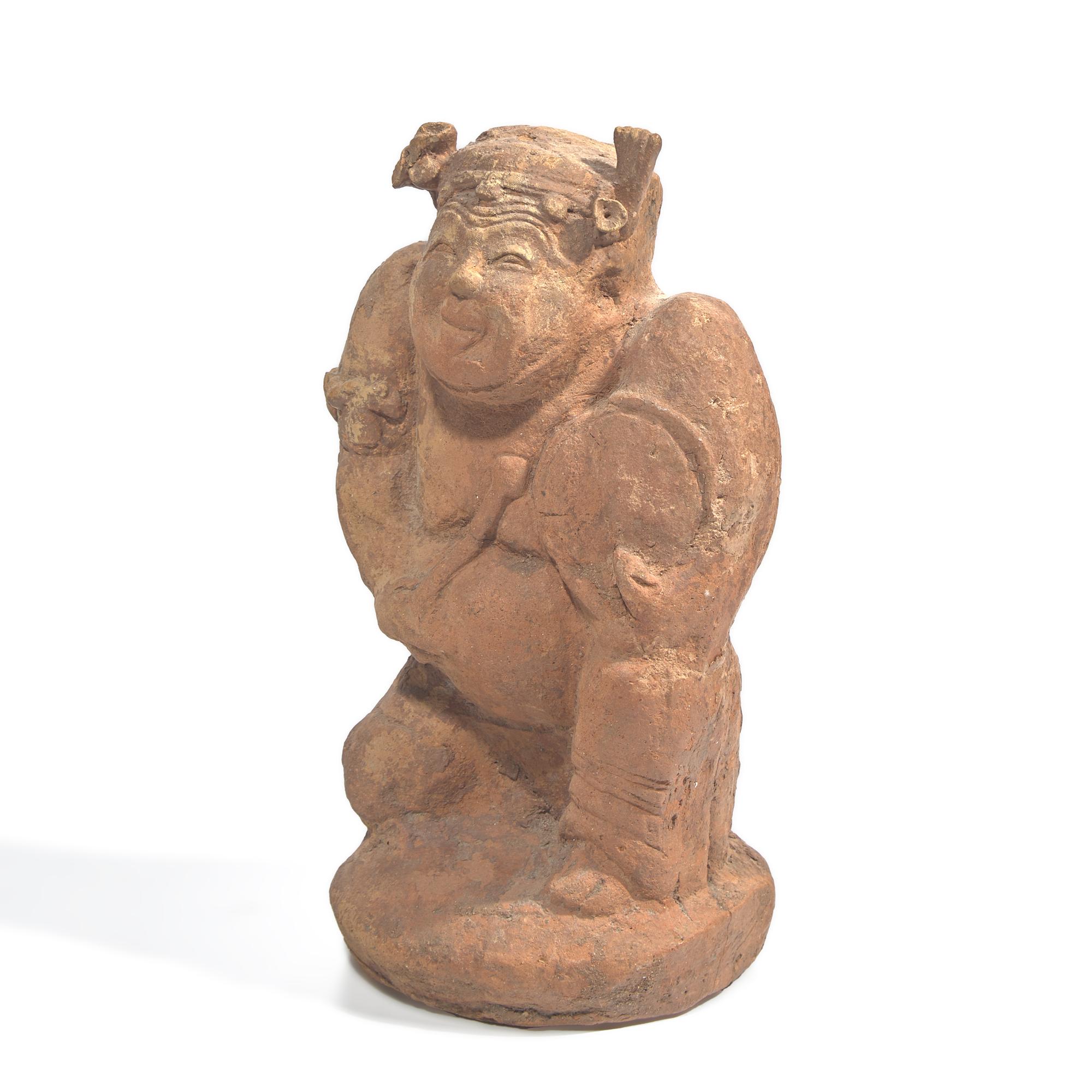 A Chinese Red Pottery Figure of a Story Teller, Eastern Han Dynasty 東漢 擊鼓説唱俑