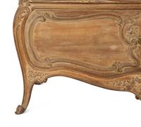 A Rococo Style Carved Bombe Side Cabinet