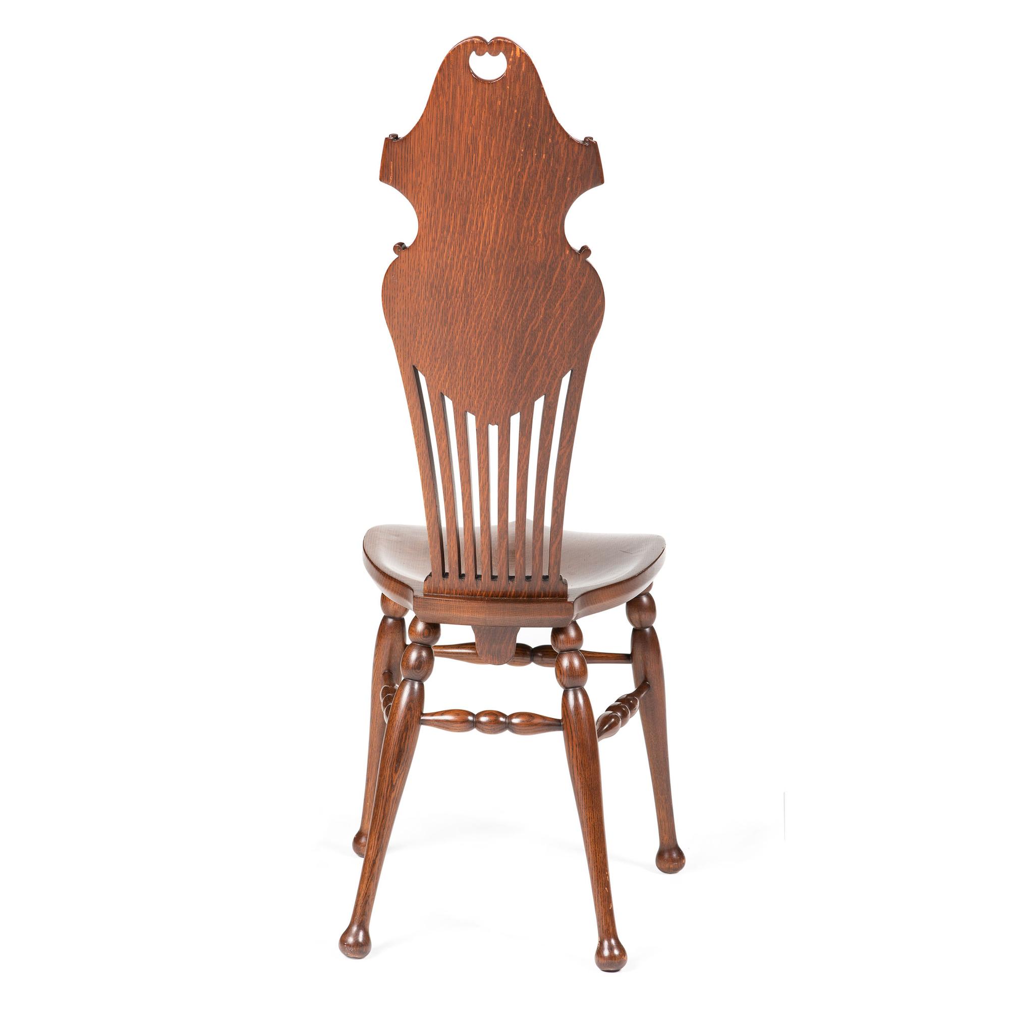 An English Carved and Pierced Oak High-Back Chair