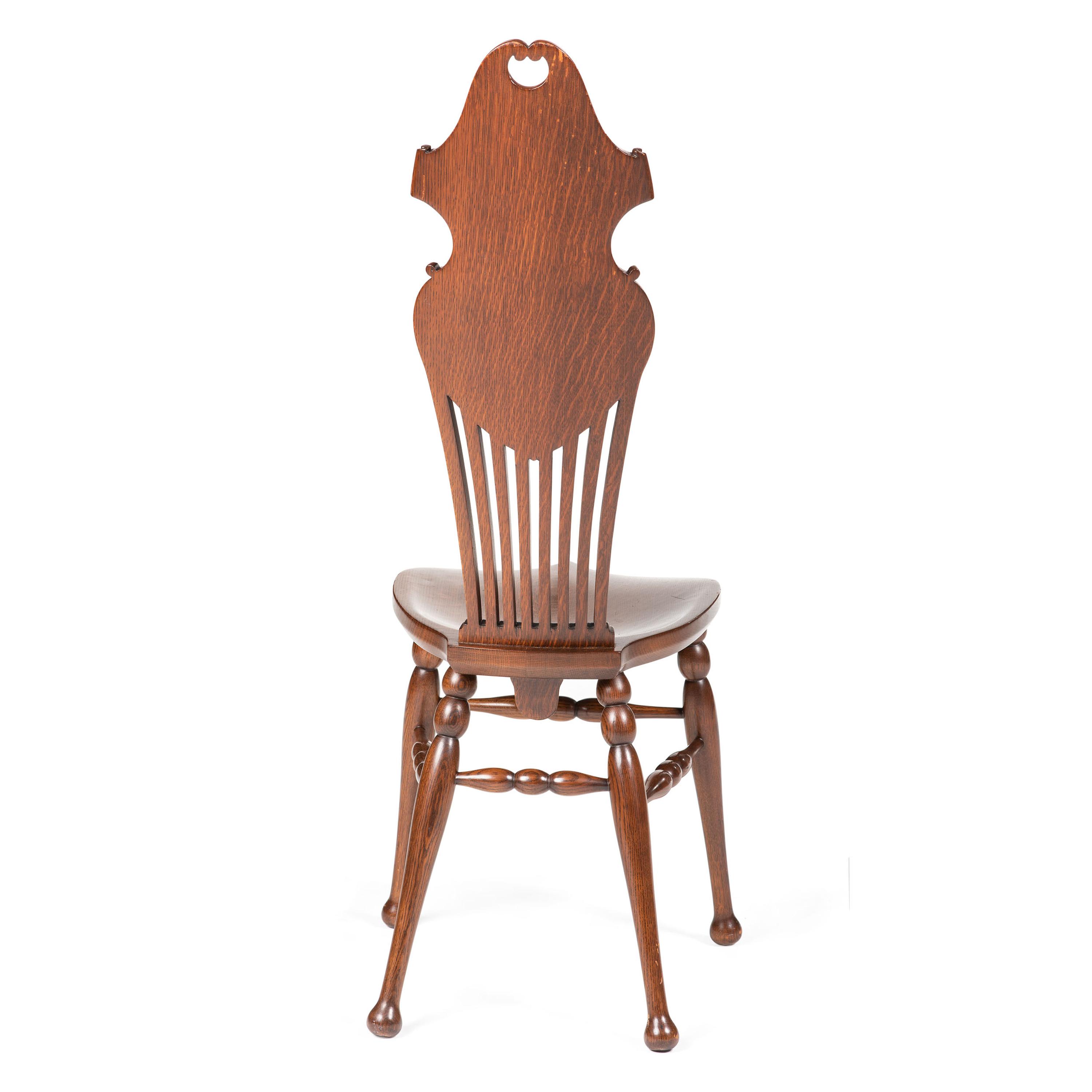 An English Carved and Pierced Oak High-Back Chair