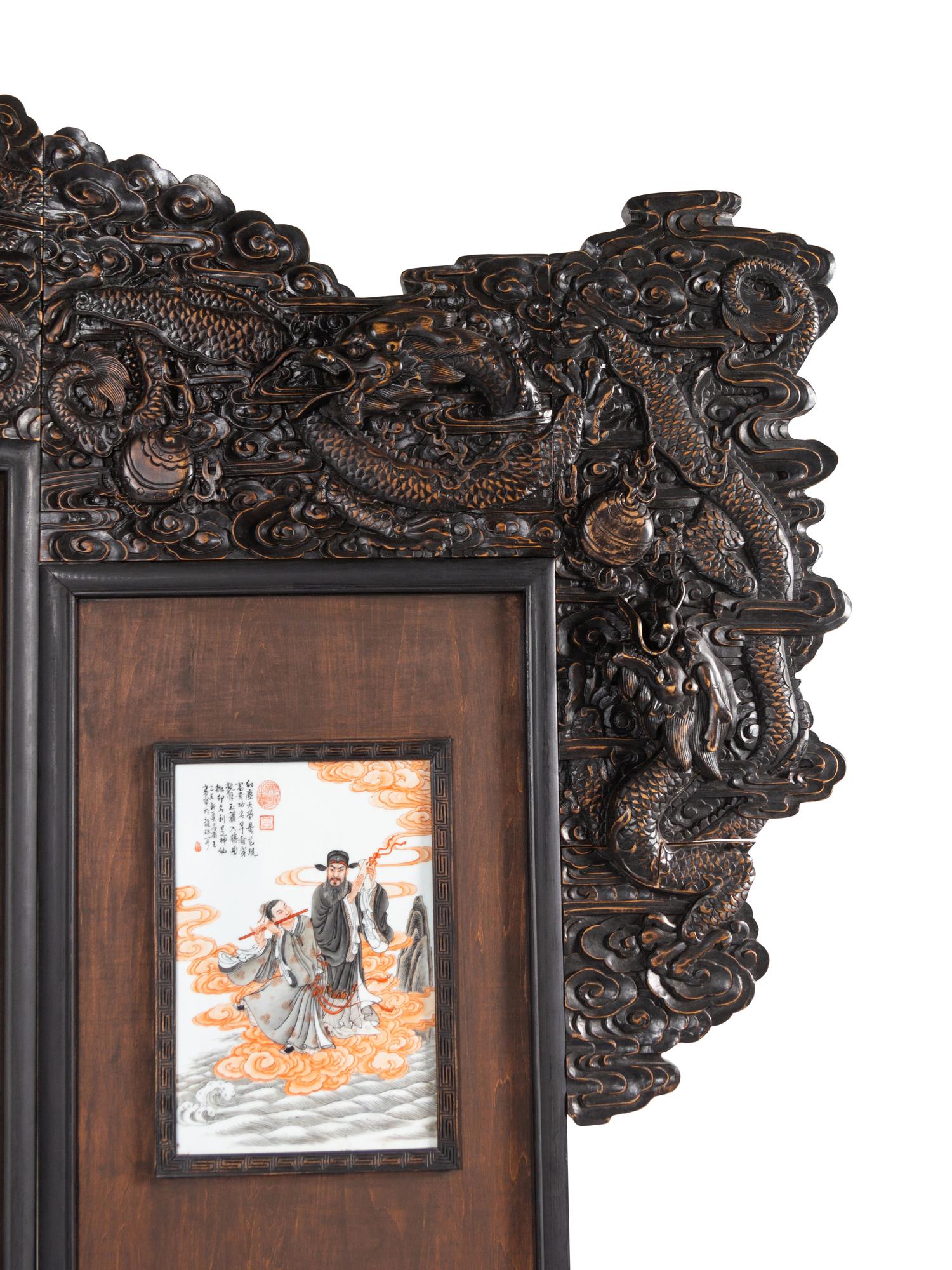 A Large Chinese Porcelain Inset Hardwood Screen