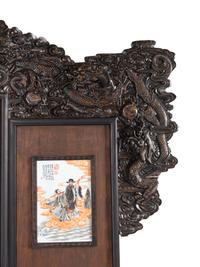 A Large Chinese Porcelain Inset Hardwood Screen