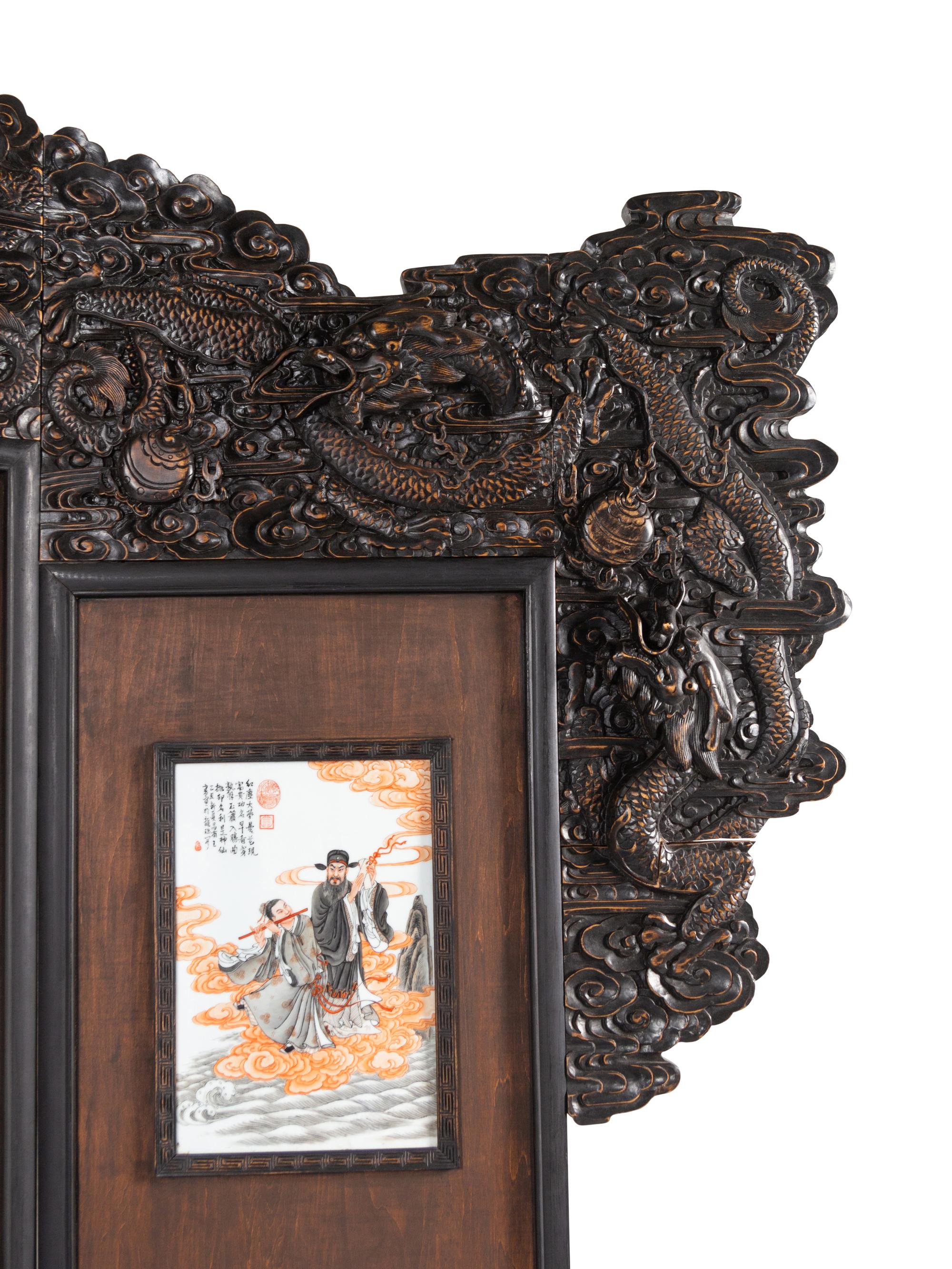 A Large Chinese Porcelain Inset Hardwood Screen