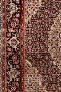 A Tabriz Wool Rug