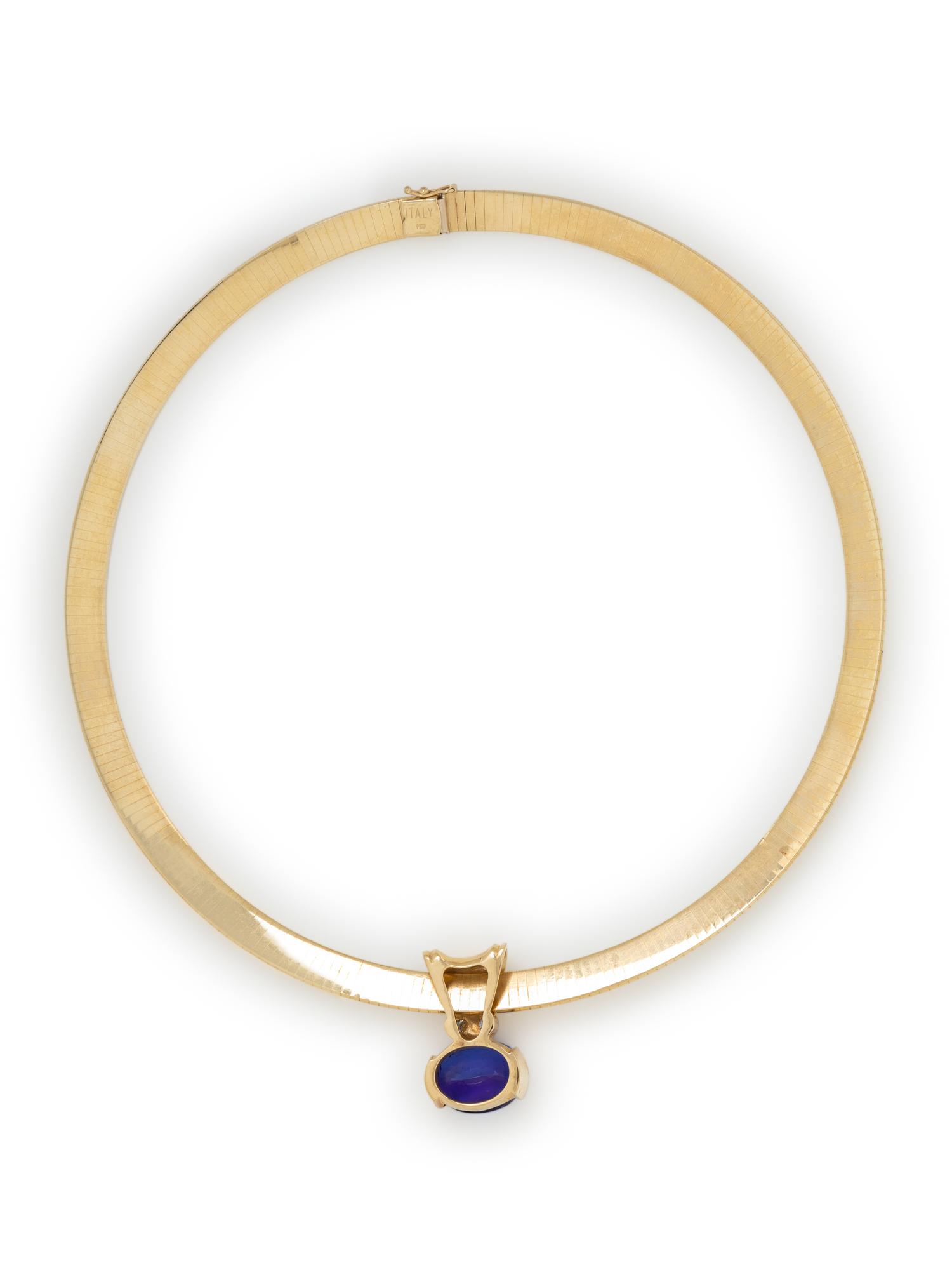 TANZANITE, DIAMOND, AND YELLOW GOLD SLIDE PENDANT WITH OMEGA CHAIN