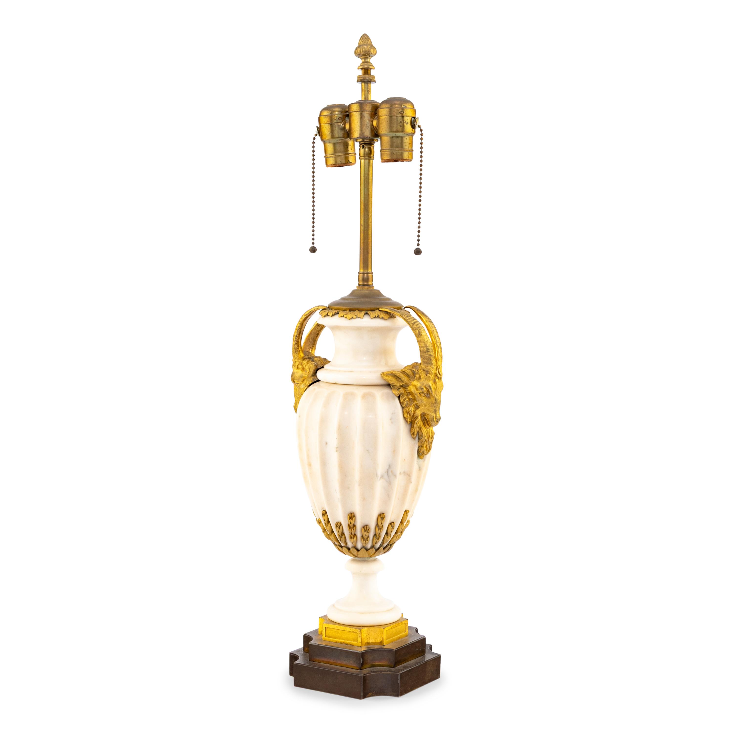 A French Neoclassical Style Gilt Bronze Mounted Marble Urn