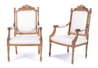A Pair of Louis XVI Style Carved Giltwood Fauteuils Height 40 inches. — 19TH CENTURY