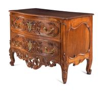 A Louis XV Provincial Carved Walnut Commode