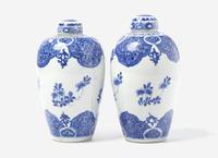 A Similar Pair of Chinese Blue and White Ovoid Jars and Covers