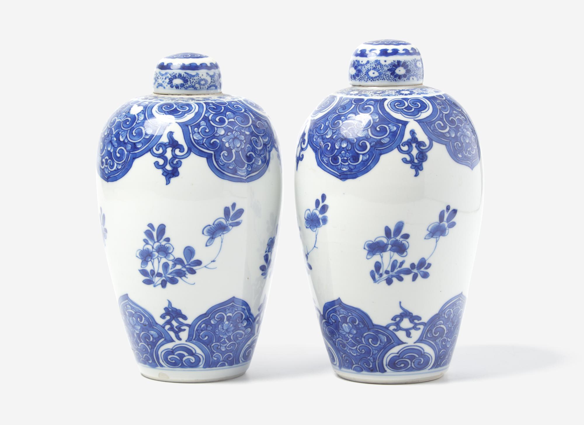 A Similar Pair of Chinese Blue and White Ovoid Jars and Covers