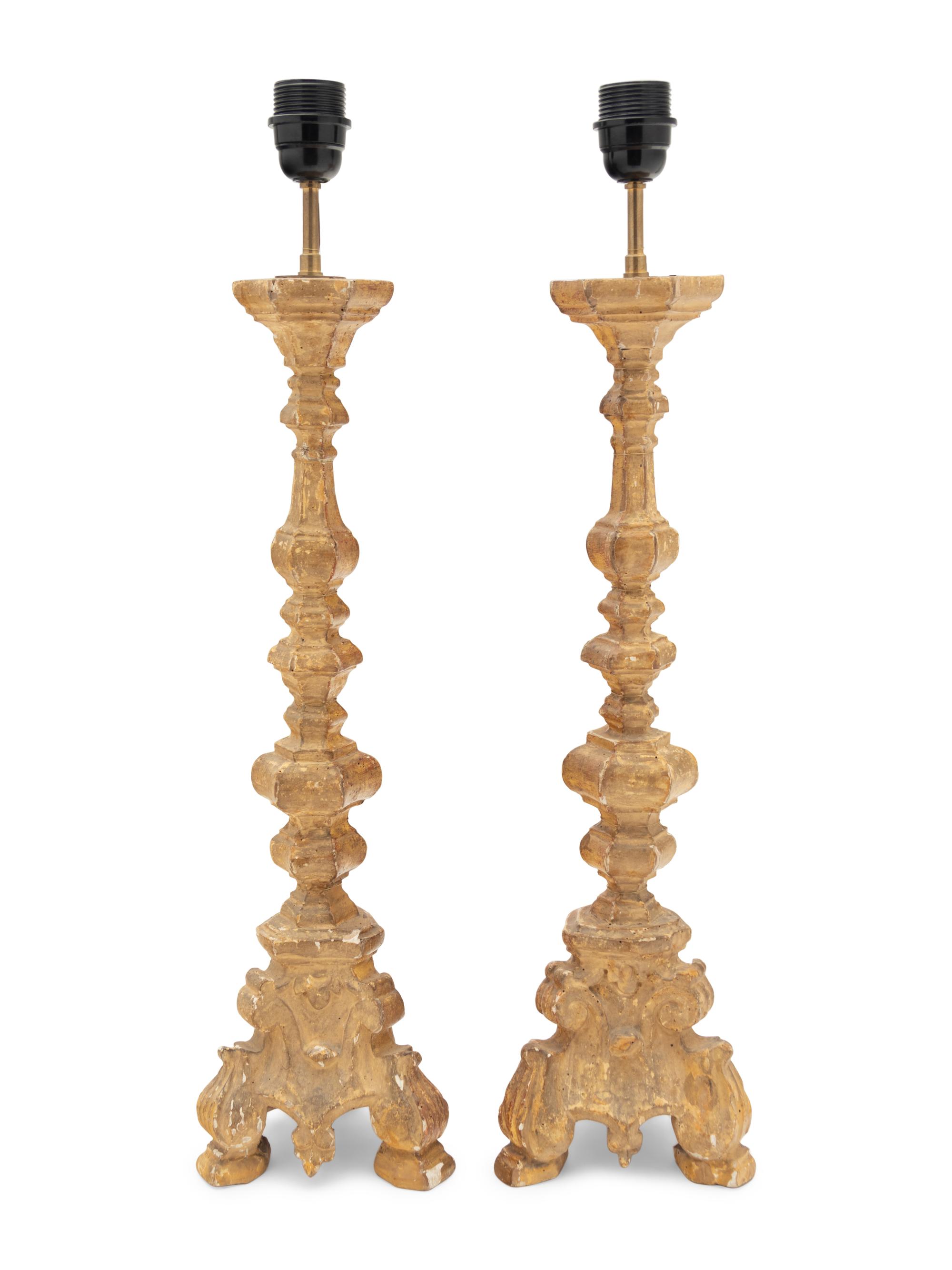 A Pair of French Giltwood Prickets Mounted as Lamps