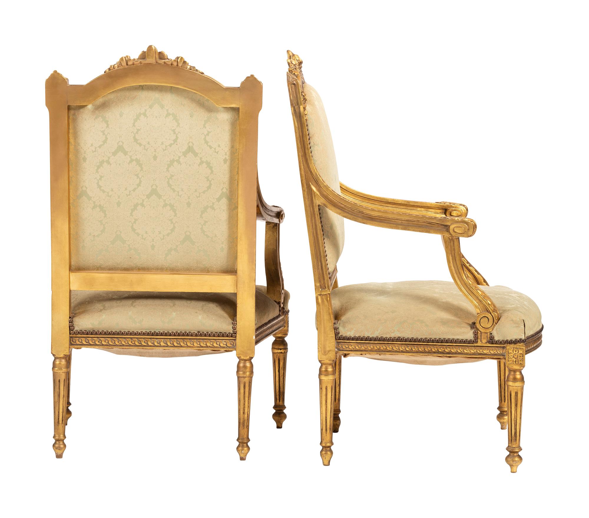 A Pair of Louis XVI-style Carved and Gilt Fauteuils