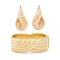 YELLOW GOLD BANGLE BRACELET AND EARRINGS