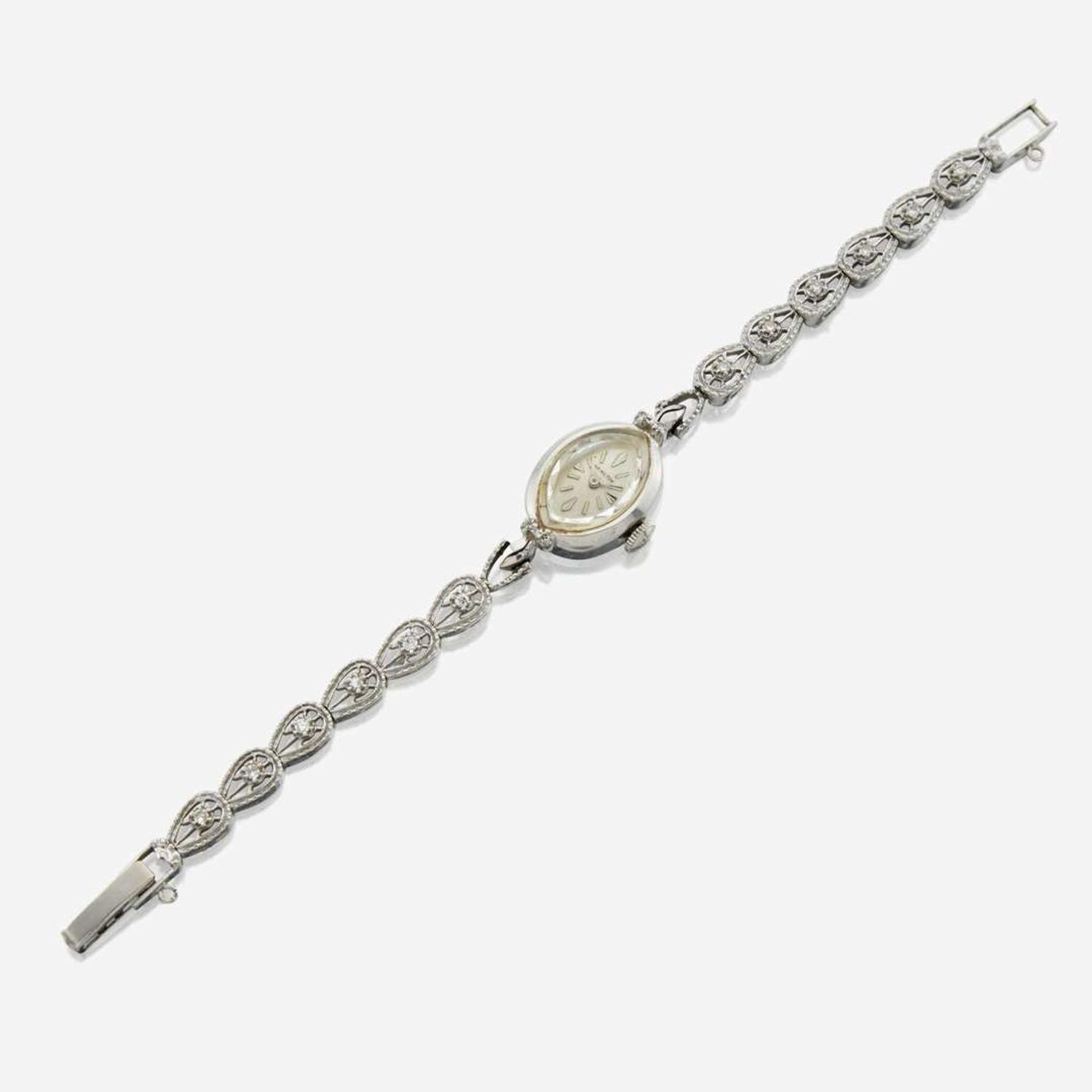 A lady's white gold diamond bracelet watch, Hamilton
