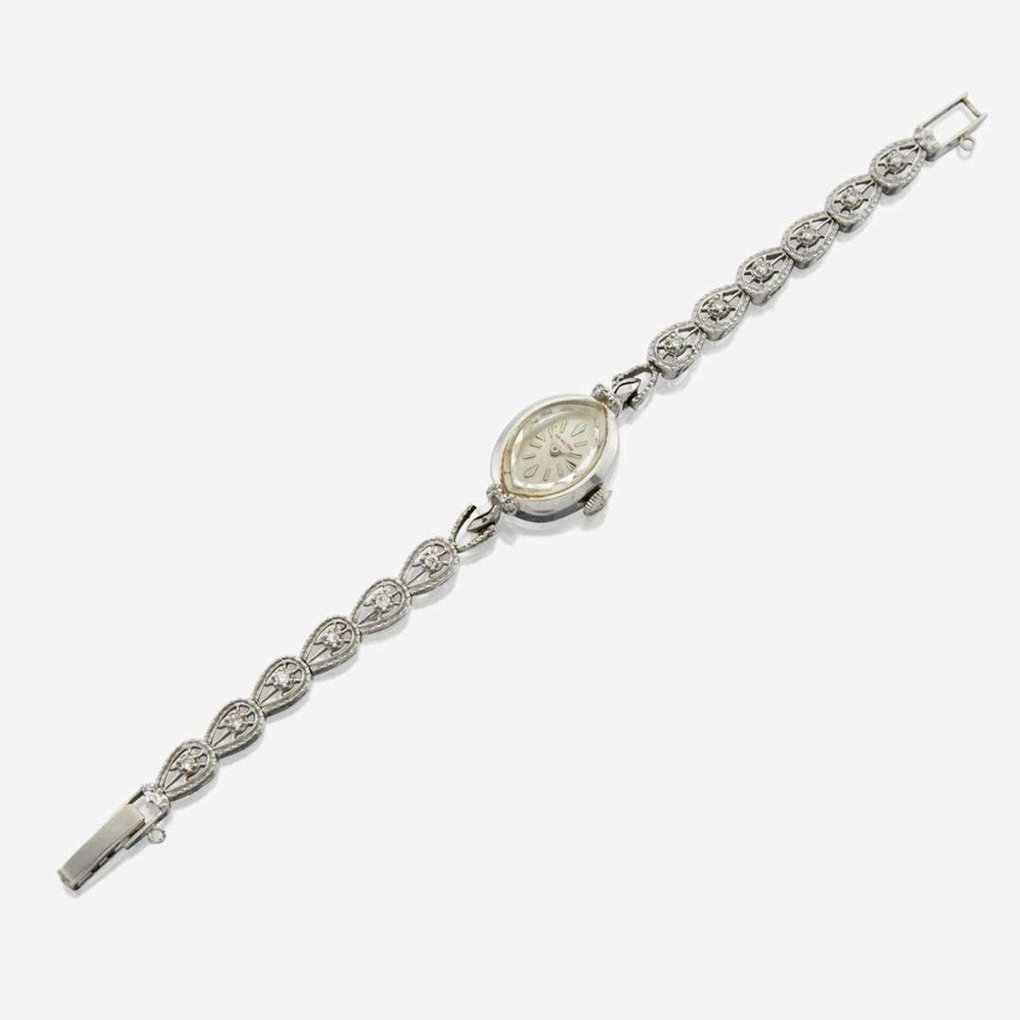 A lady's white gold diamond bracelet watch, Hamilton
