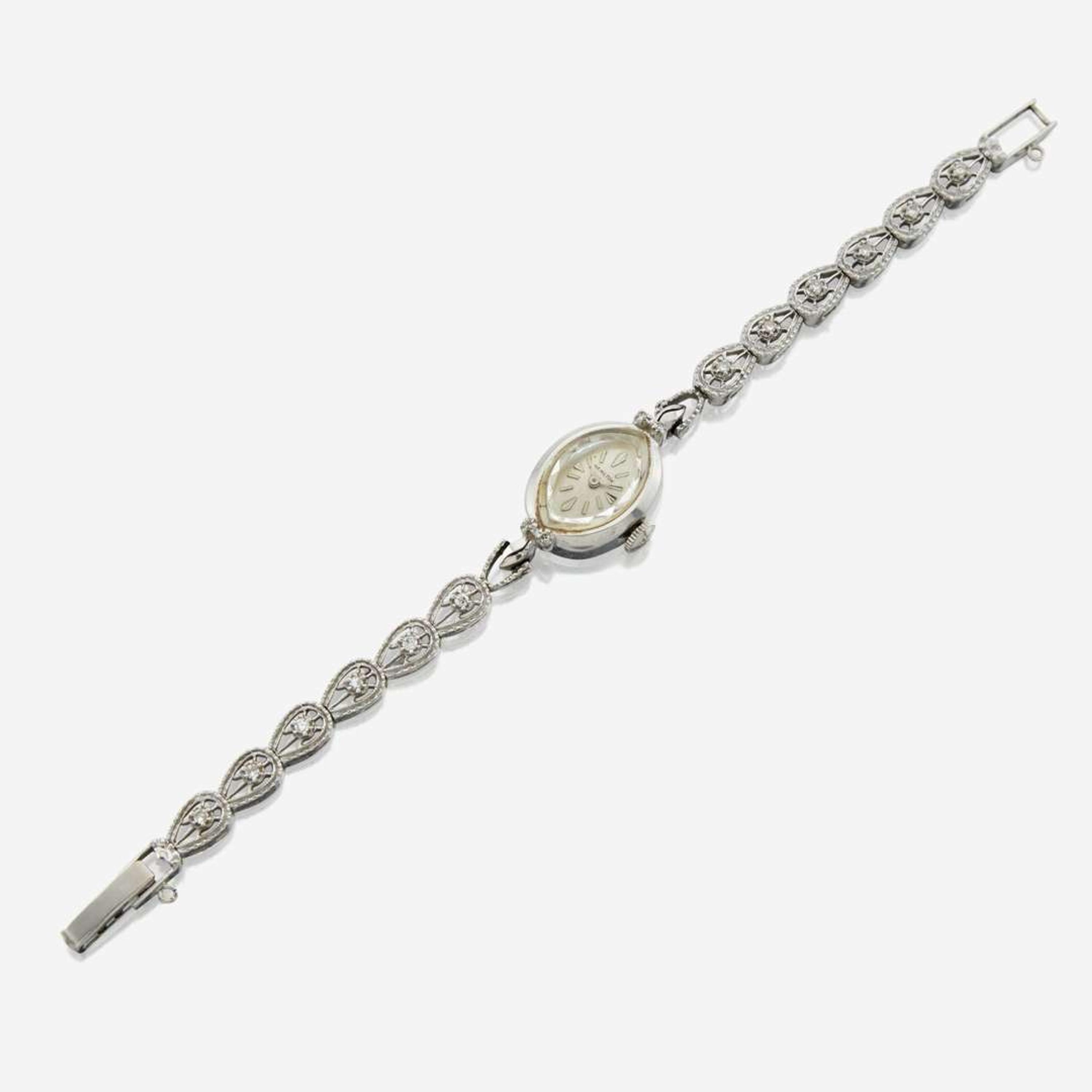 A lady's white gold diamond bracelet watch, Hamilton