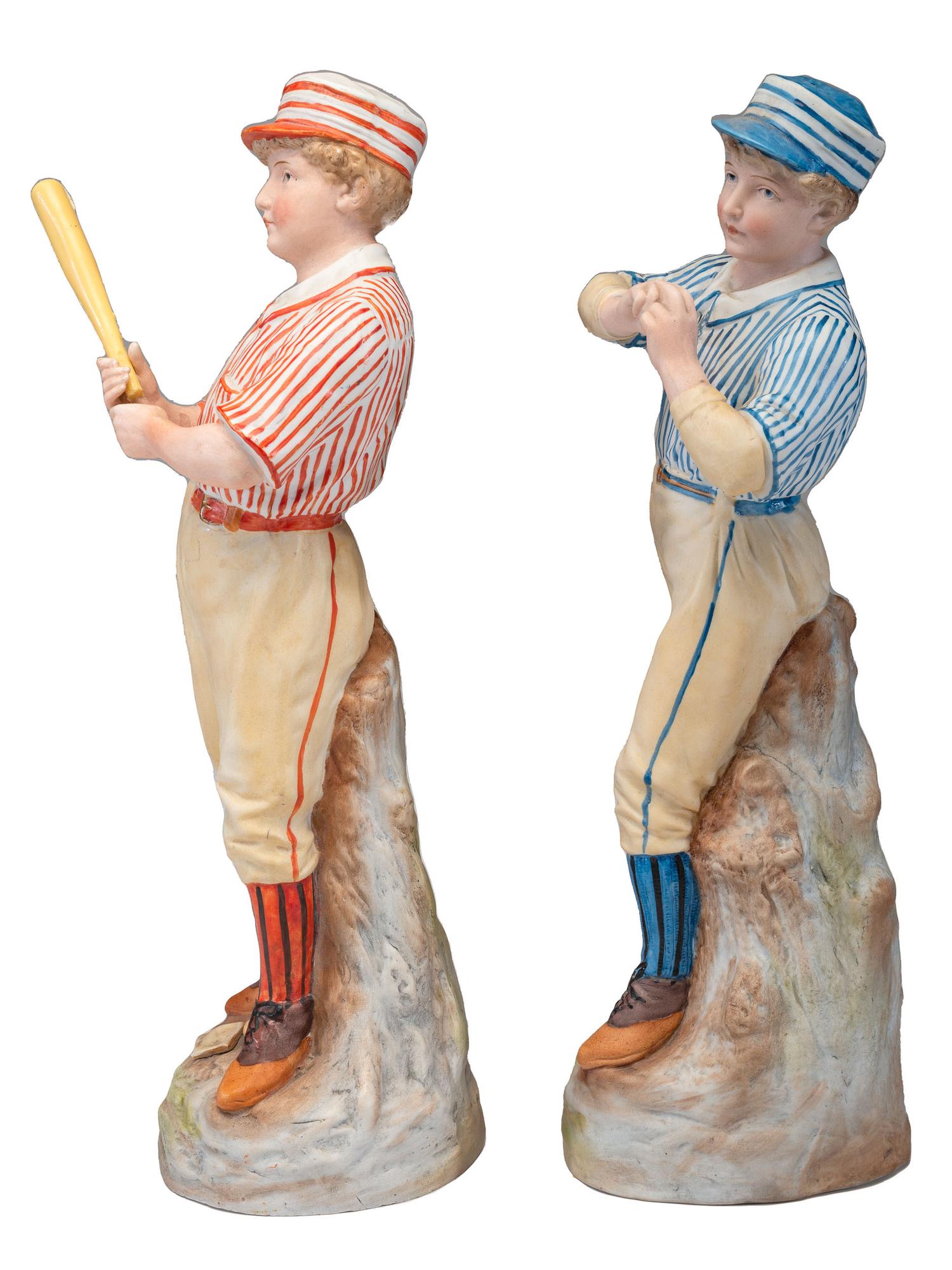 A Pair of German Bisque Porcelain Baseball Figures