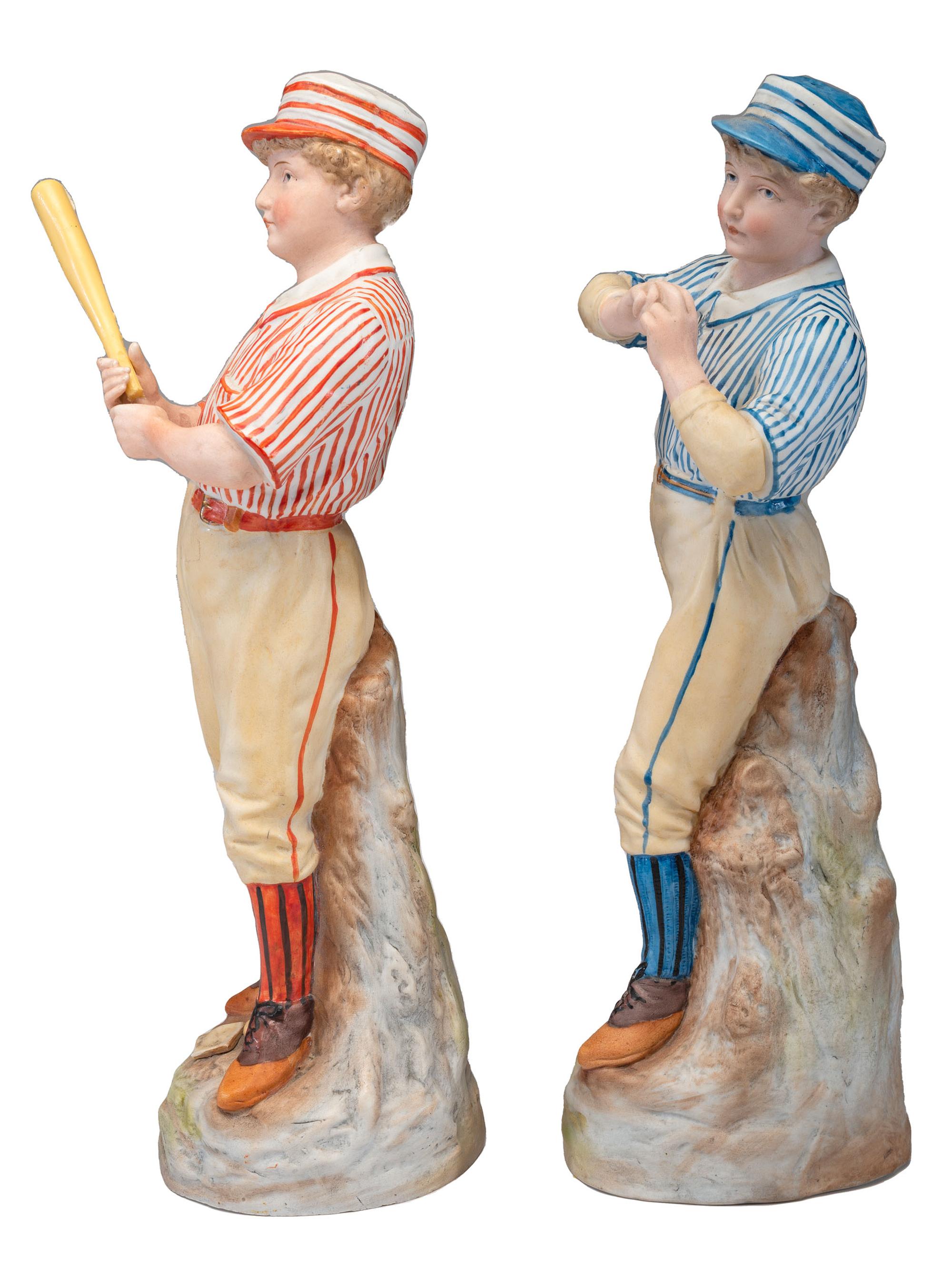 A Pair of German Bisque Porcelain Baseball Figures