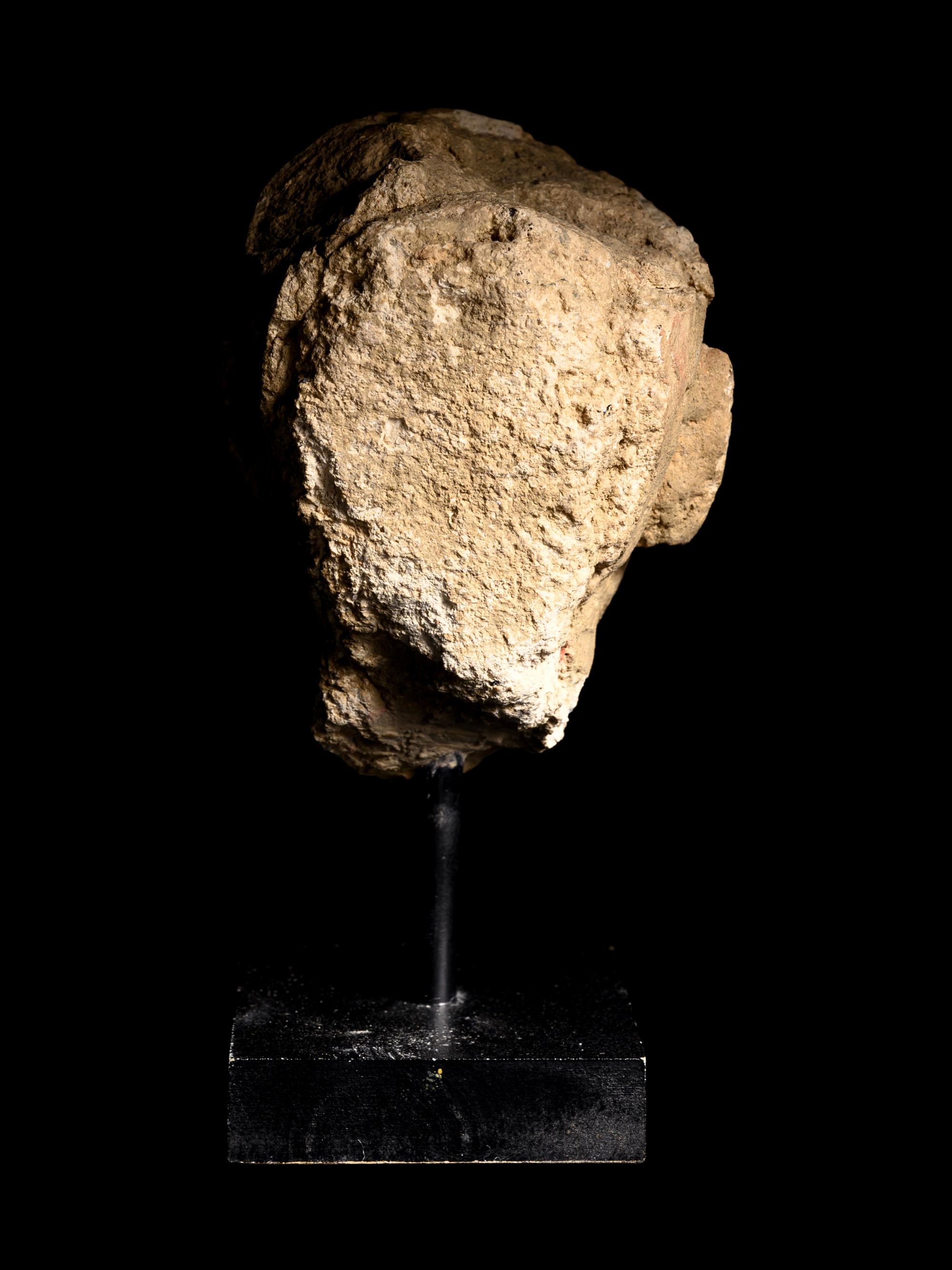 Three Gandharan Fragmentary Stucco Heads and One European Fragmentary Stucco Head