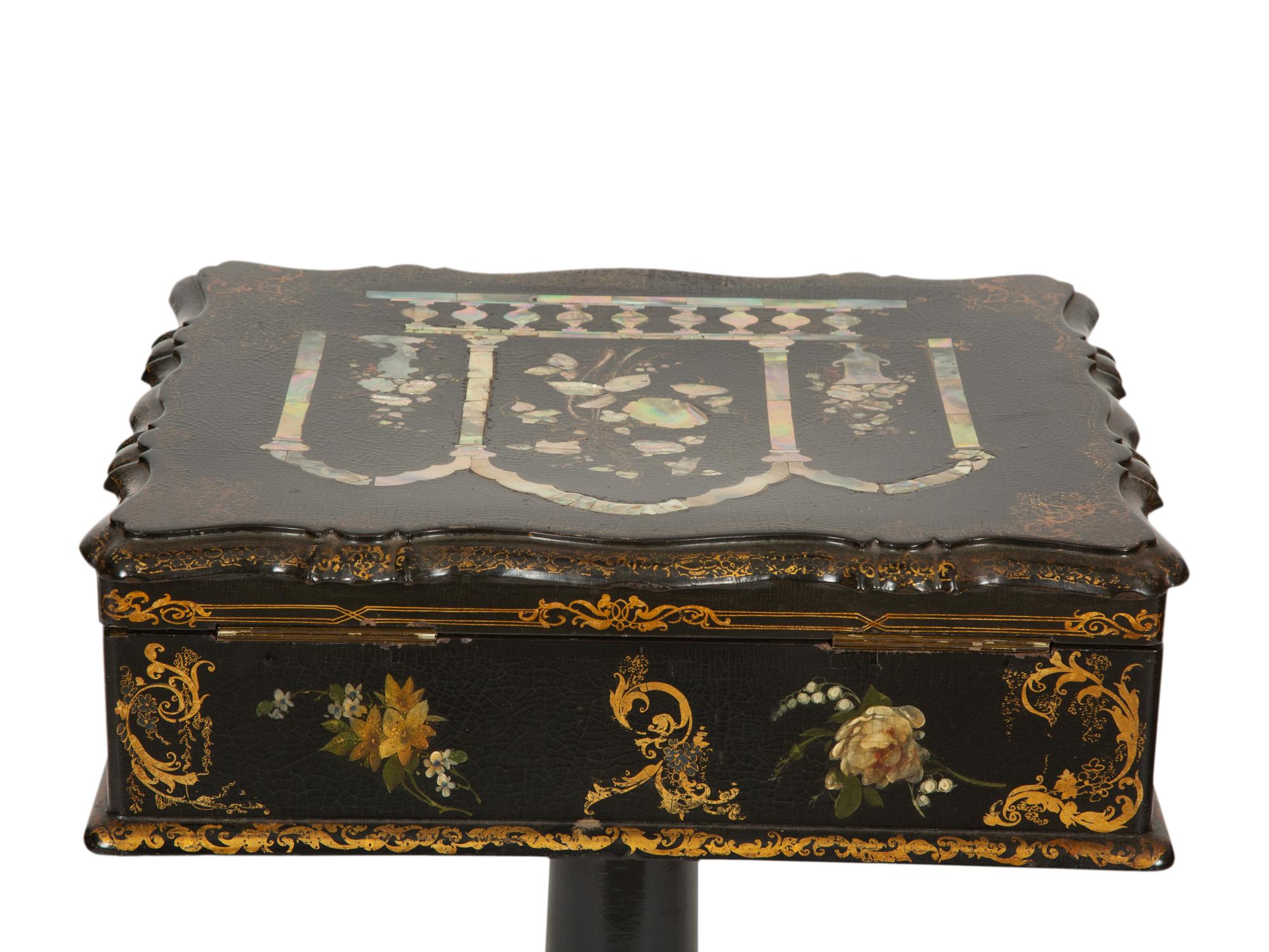 An English Victorian Black and Gilt Chinoiserie Sewing Table with Mother-of-Pearl Inlay