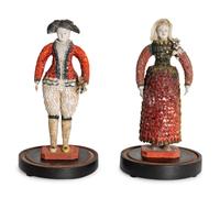 A Pair of French Carton Moule "Seaside" Dolls
