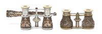 Two Pairs of Continental Silver or Silvered Metal Cased Opera Glasses, Width of first 3 3/4 inches.