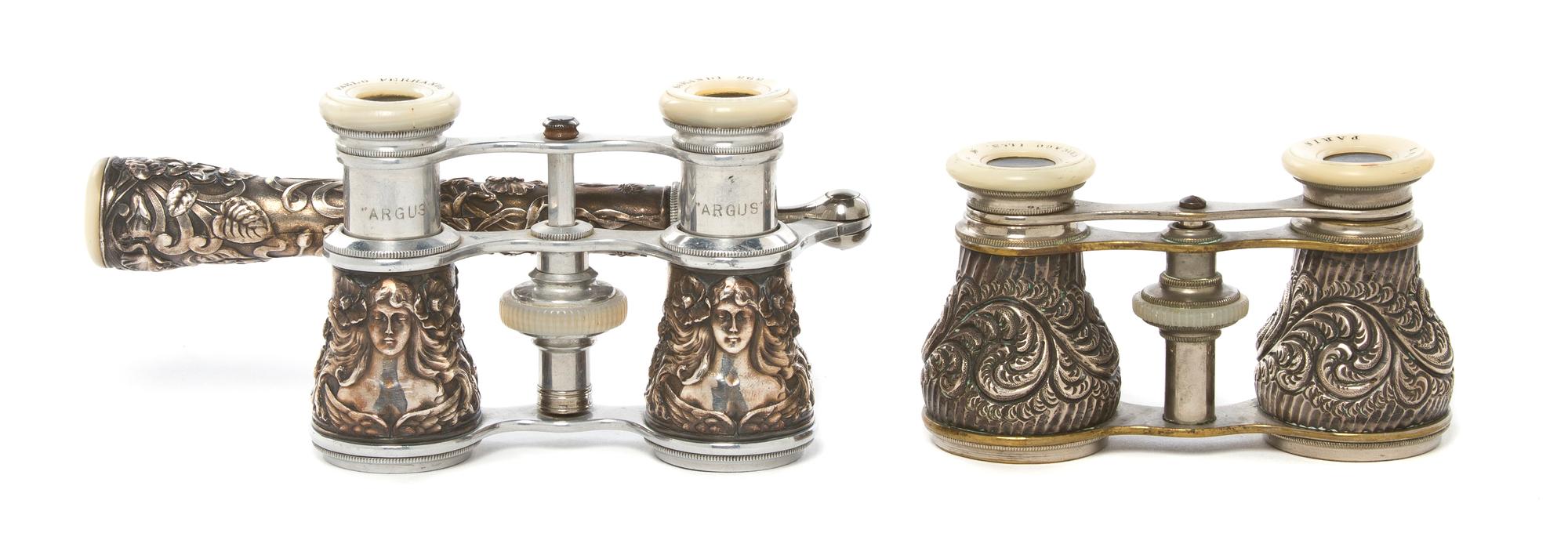 Two Pairs of Continental Silver or Silvered Metal Cased Opera Glasses, Width of first 3 3/4 inches.