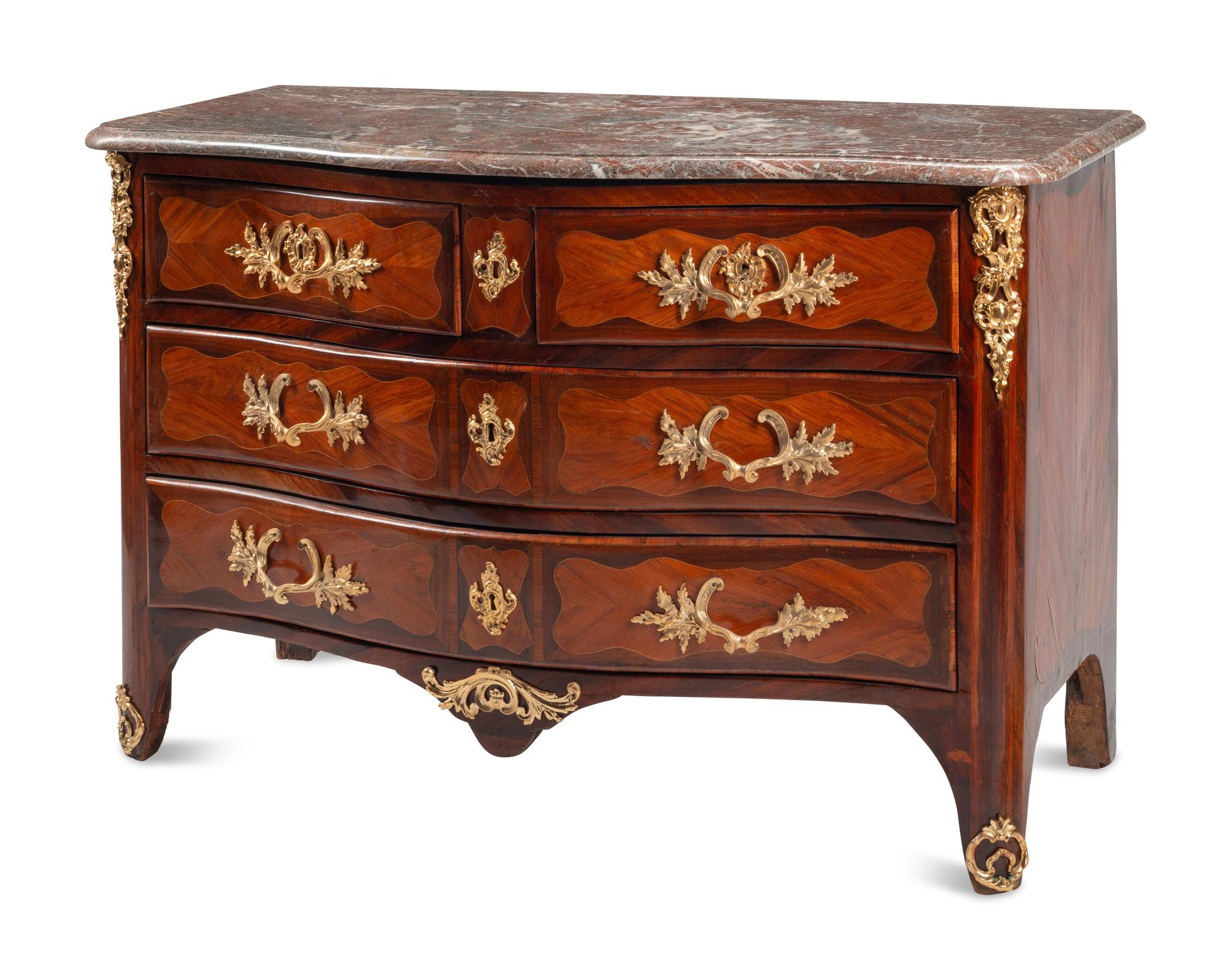 A Régence Gilt Bronze Mounted Kingwood and Tulipwood Parquetry Marble-Top Commode