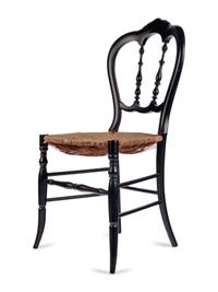 [LINCOLN ASSASSINATION]. An ebonized wooden chair purportedly used at Ford's Theatre during the performance of Our American Cousin , 14 April 1865.