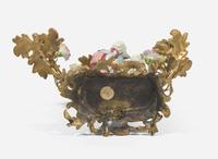 A gilt-bronze mounted Chinese figural porcelain three-light candelabra, the figure 18th century, the gilt bronze 19th century