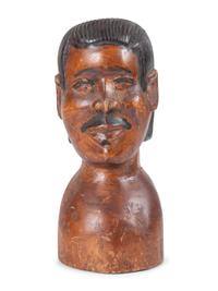 A Carved and Painted Wood Bust of a Mustachioed Man