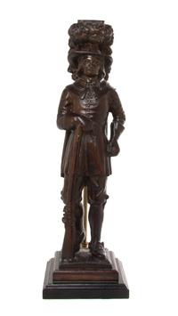 A Continental Carved Figure, Height 17 1/2 inches.