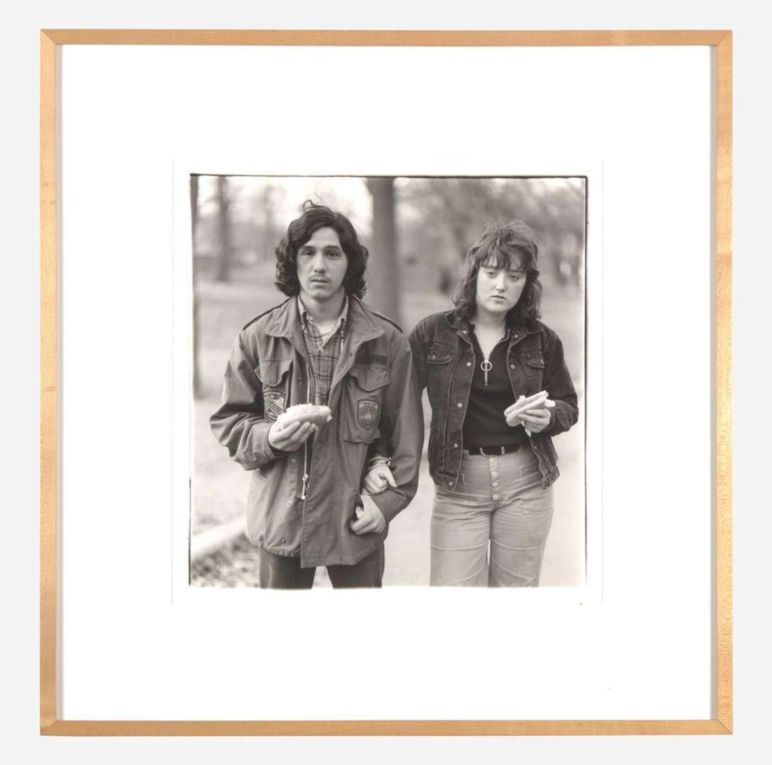 Diane Arbus (American, 1923-1971) A Young Man and His Girlfriend with Hot Dogs in the Park, N.Y.C.