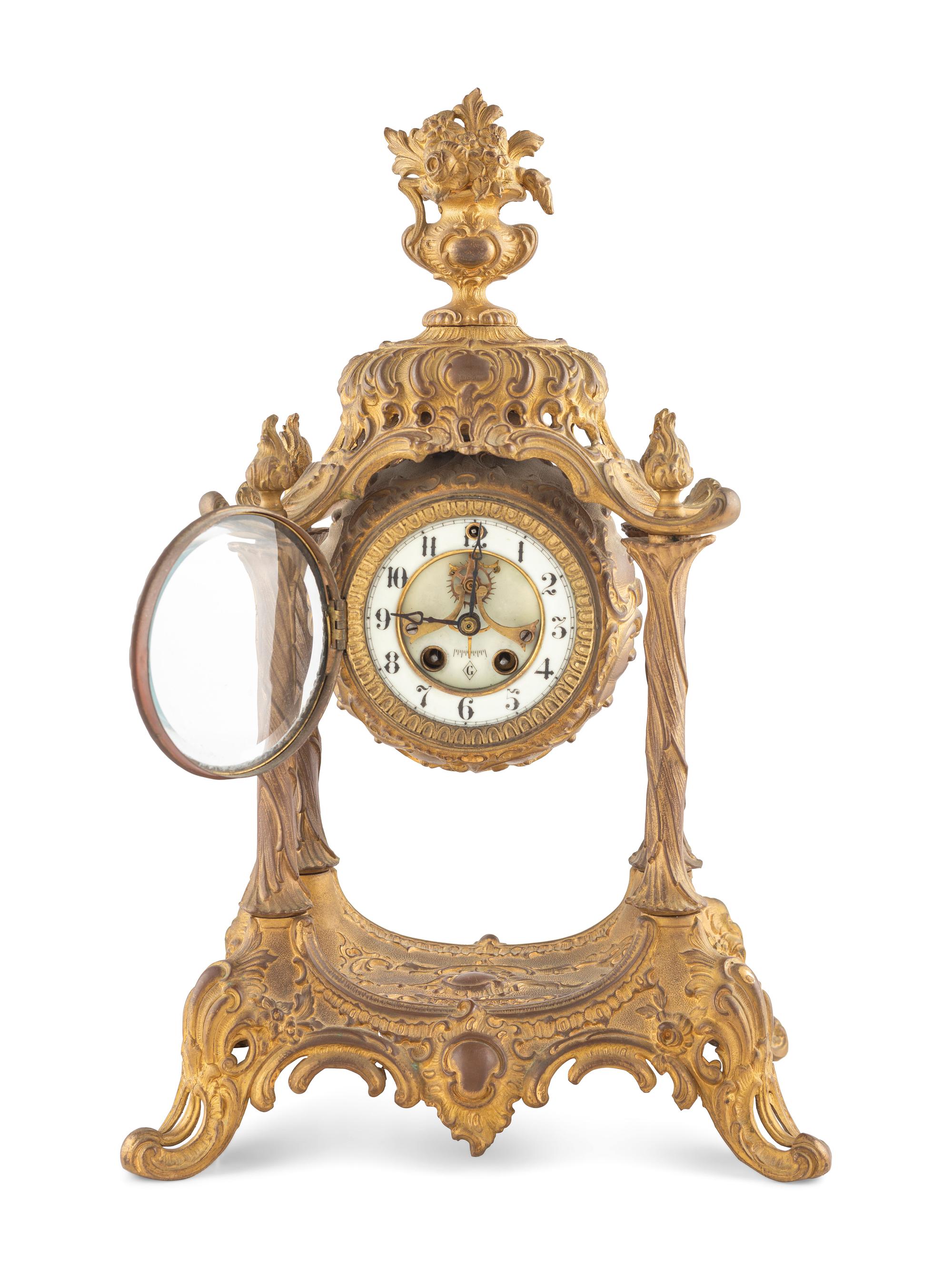 A Louis XV Style Gilt Metal Mantel Clock