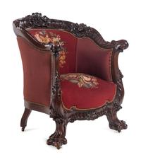 A Rococo Revival Carved Walnut Three-Piece Seating Suite in the Style of Karpen
