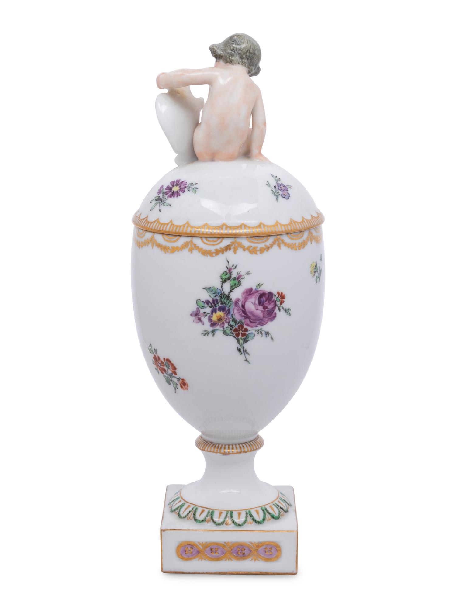 A Royal Copenhagen Porcelain Cup and Cover
