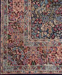 A Kirman Wool Rug