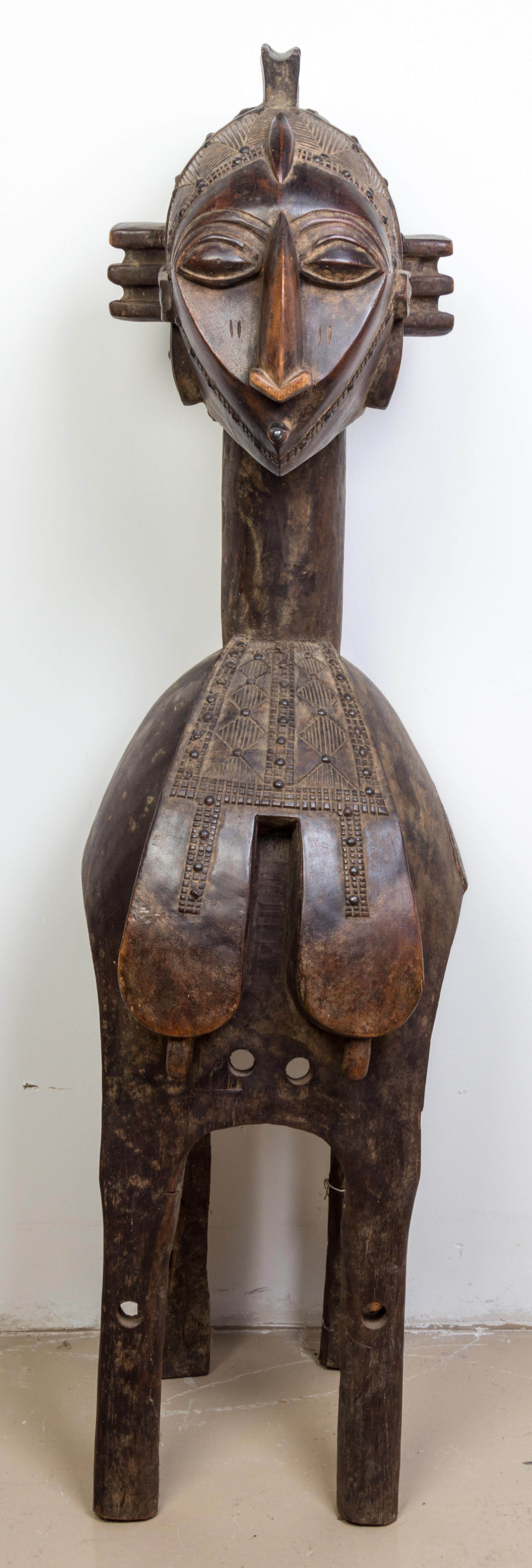A Baga Female Figure Height 52 1/2 inches.