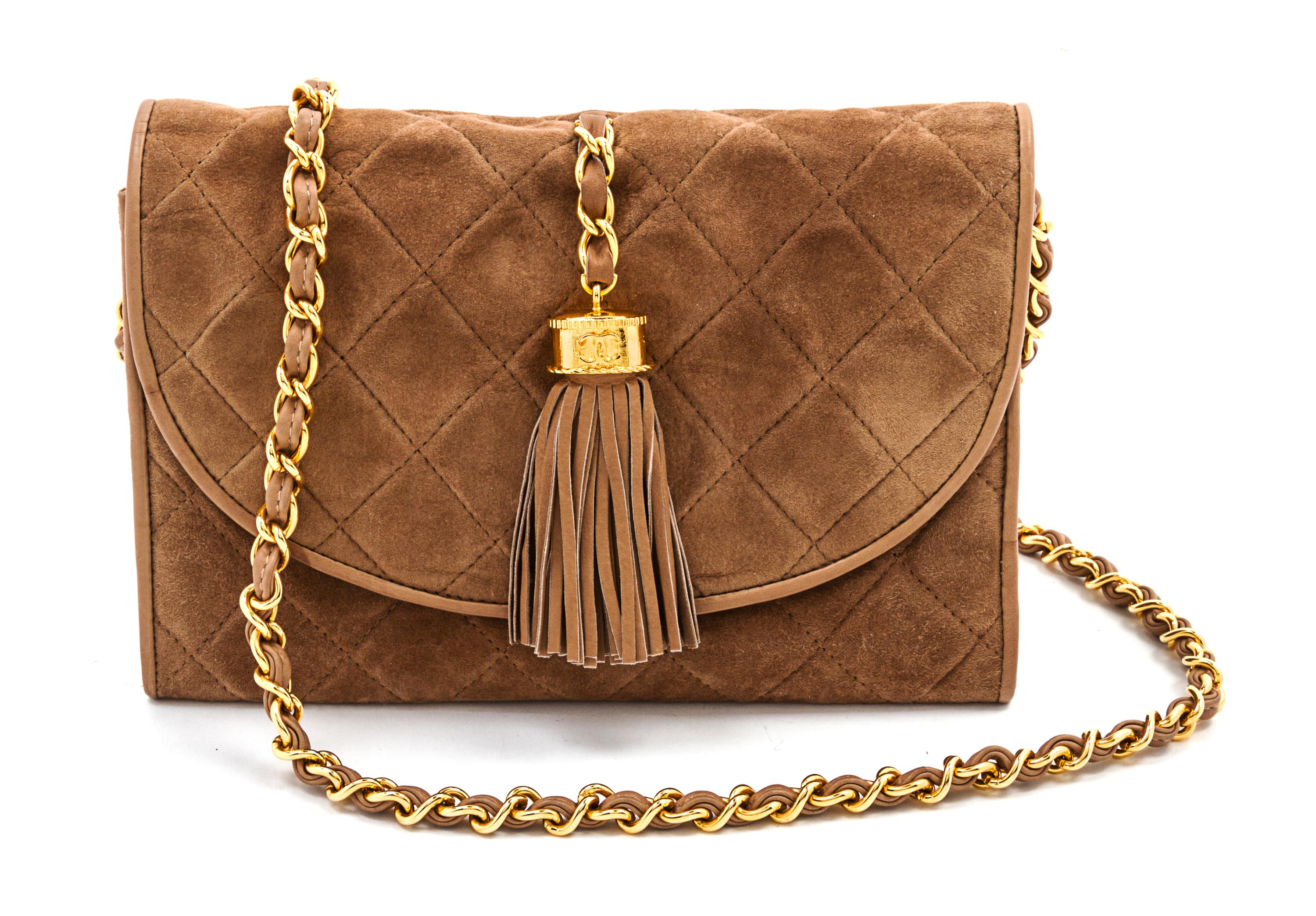 A Chanel Tan Suede Quilted Flap Bag, 8 x 5 1/2 x 1 1/2 inches.