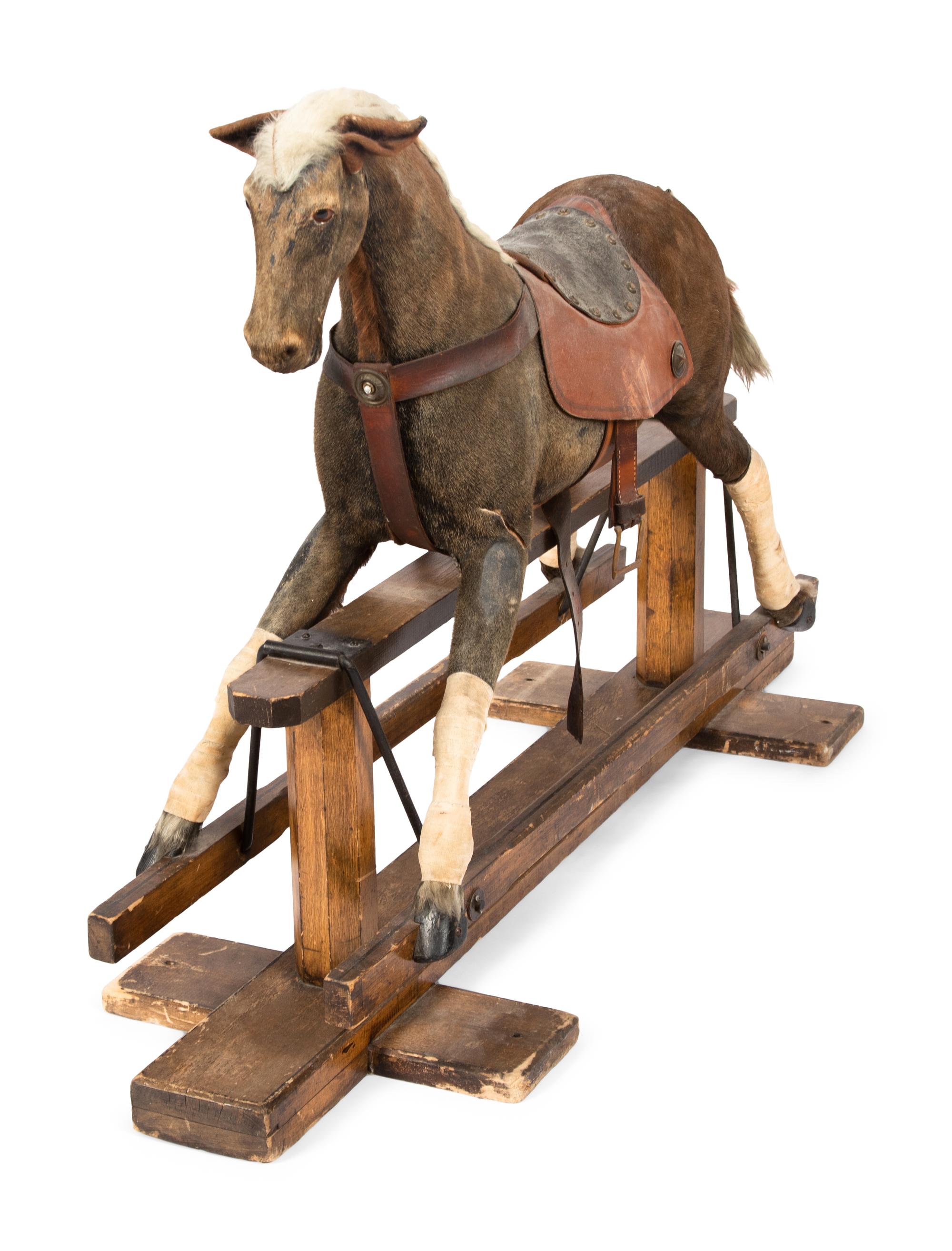 A Child's Horse Hair Upholstered Riding Toy