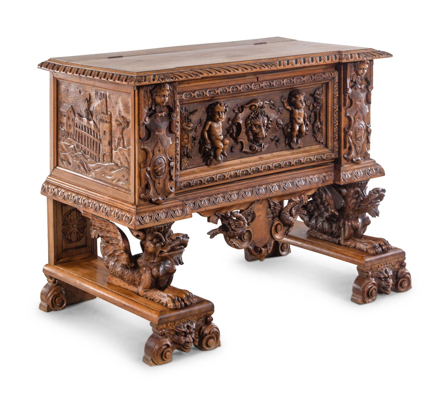 An Italian Renaissance Revival Carved Walnut Cassone on Stand