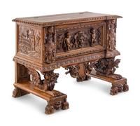 An Italian Renaissance Revival Carved Walnut Cassone on Stand