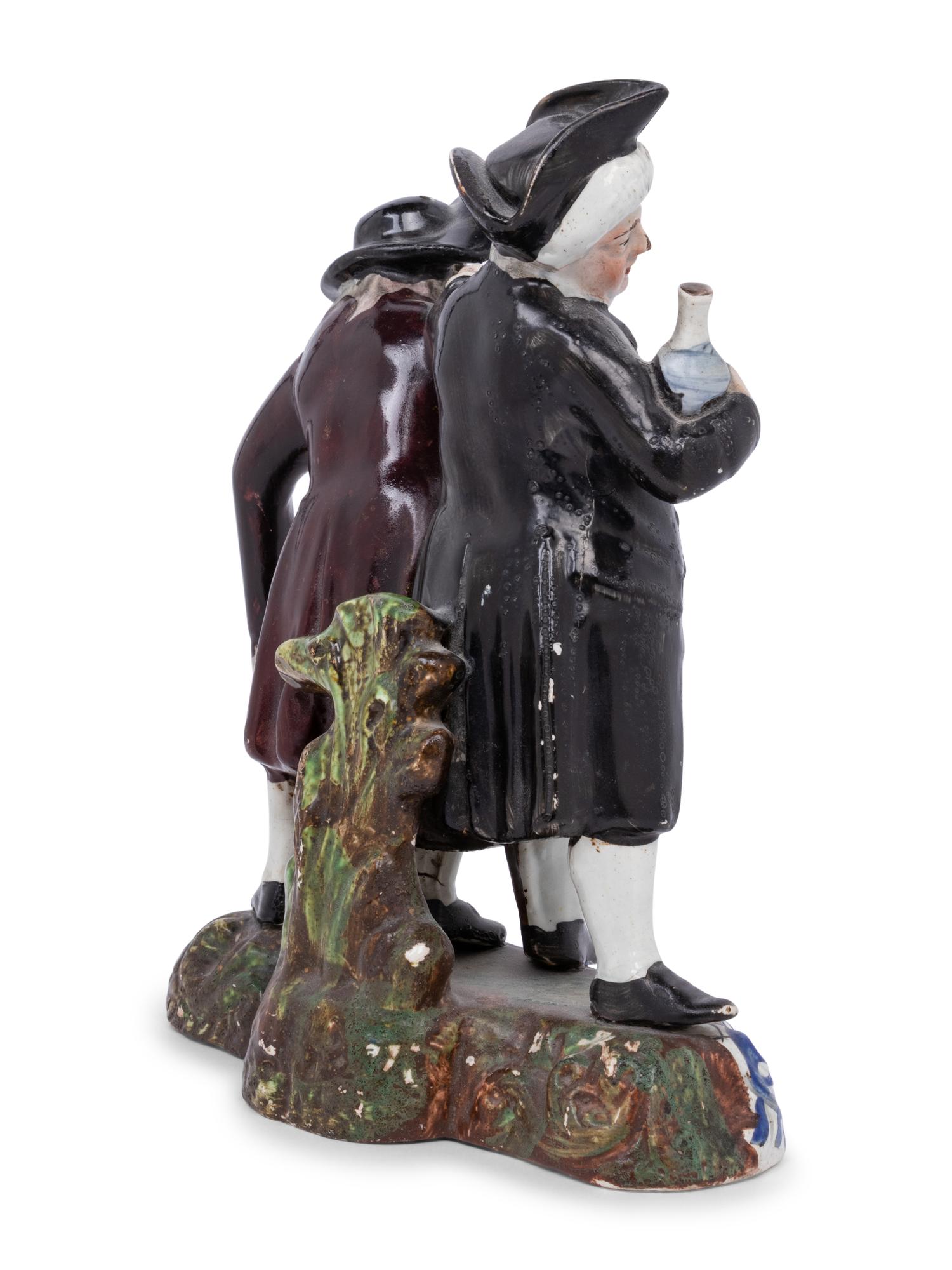 A Victorian Glazed Earthenware Figural Group