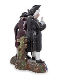 A Victorian Glazed Earthenware Figural Group