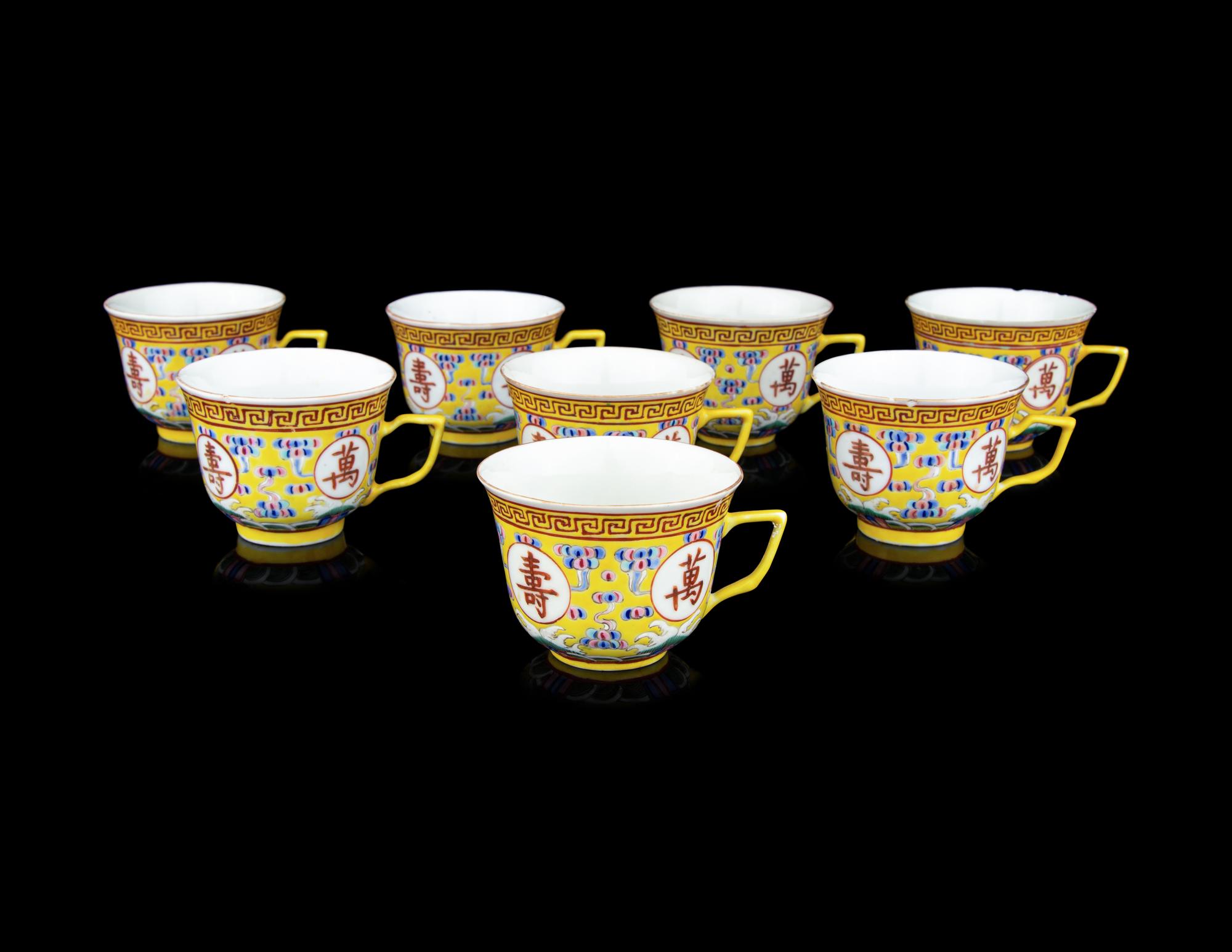 Eight Chinese Famille Jaune Porcelain Tea Cups