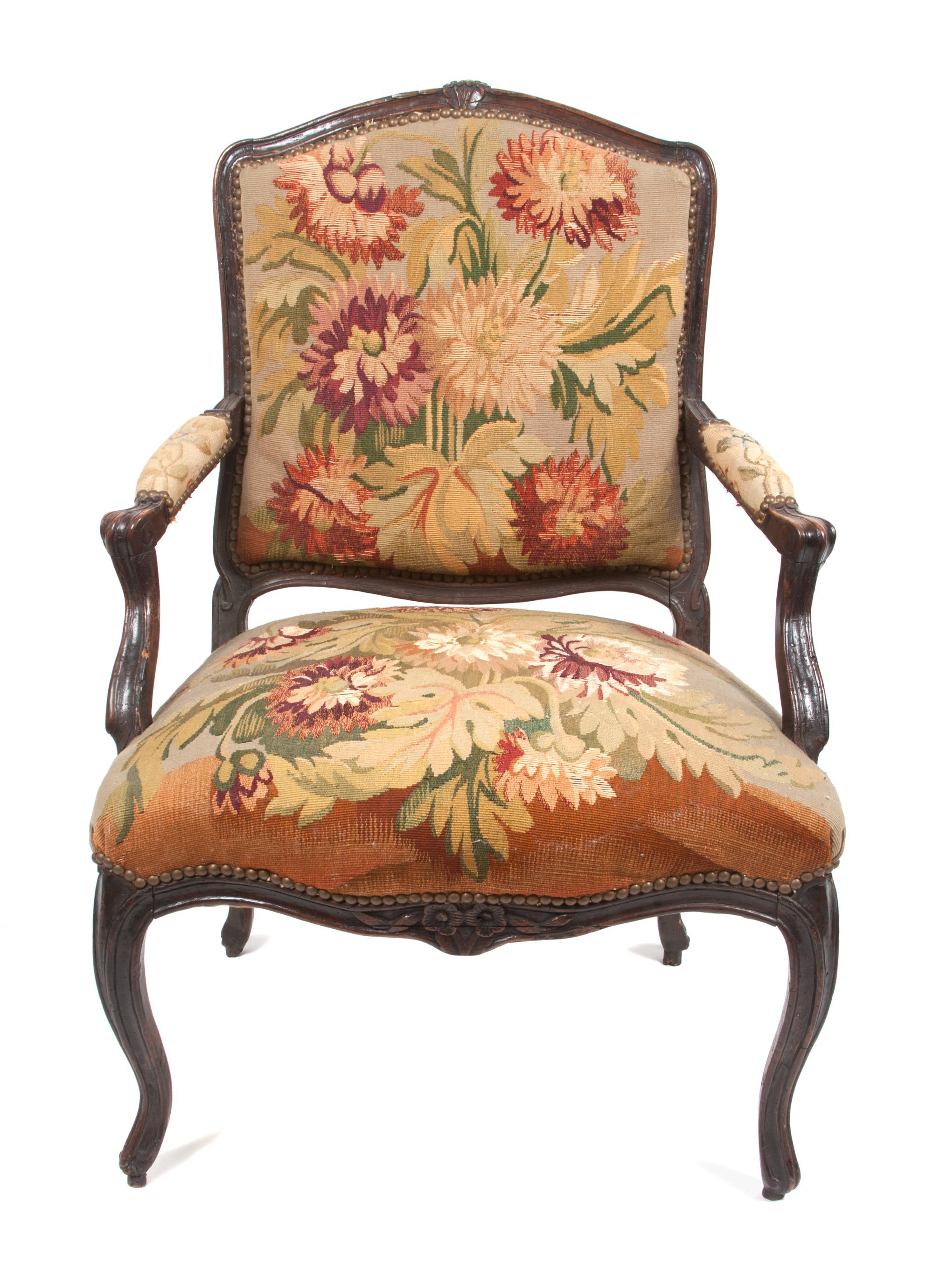 A Louis XV Tapestry Upholstered Fauteuil Height 35 3/4 inches.