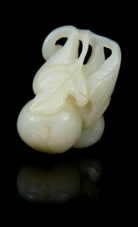 A Carved Jade Toggle Length 2 inches.